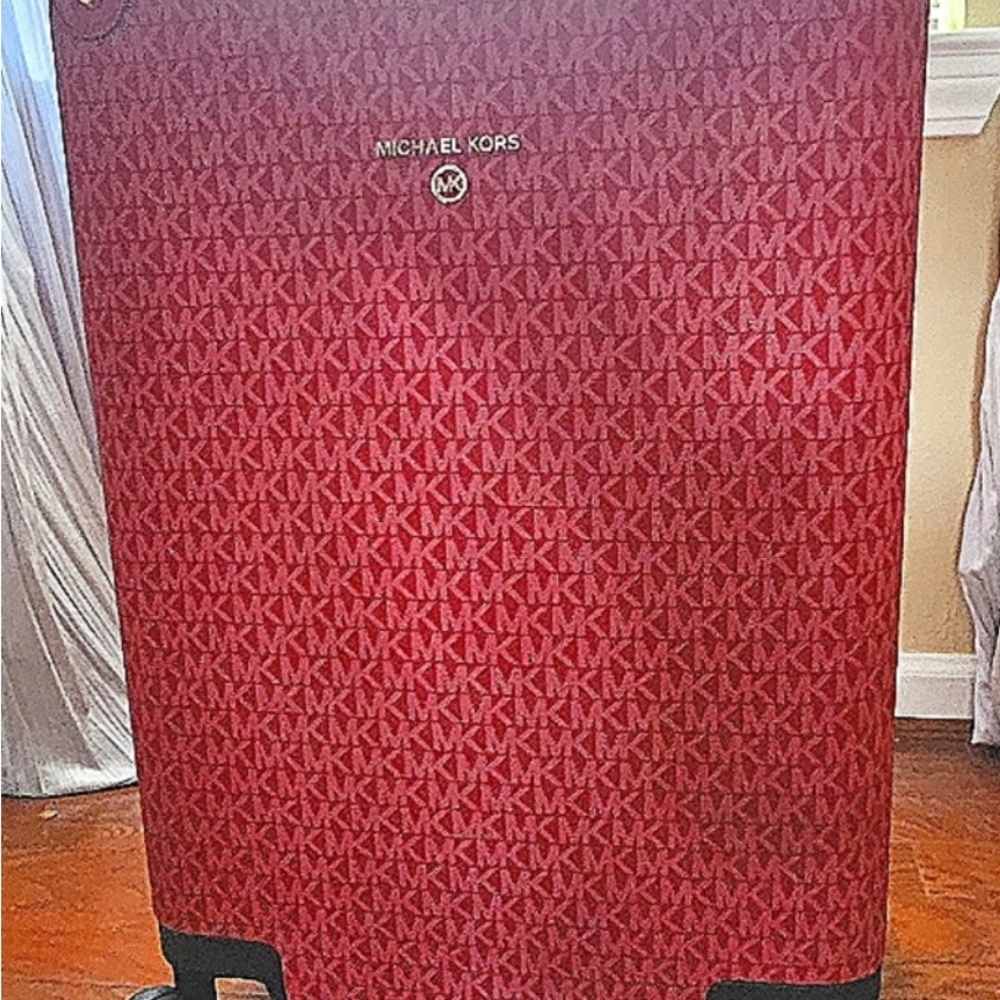 MK logo suitcase